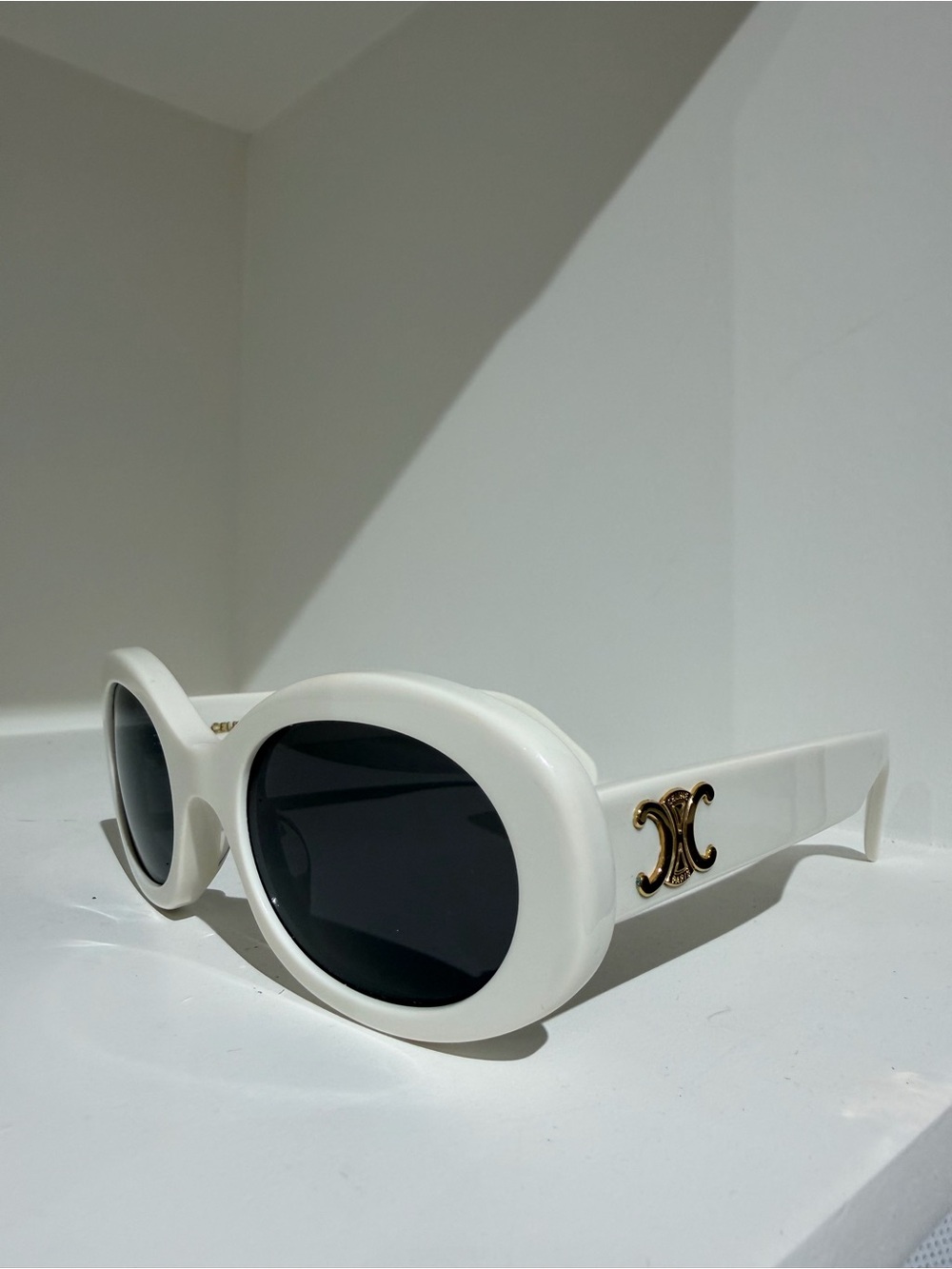 Celine Triomphe Oval Sunglasses in White